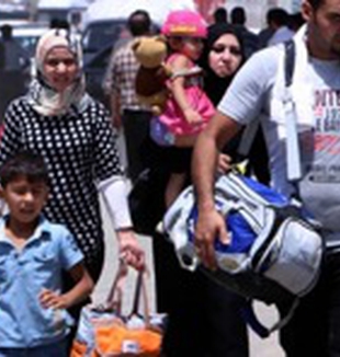 Familias que huyen de Mosul.
